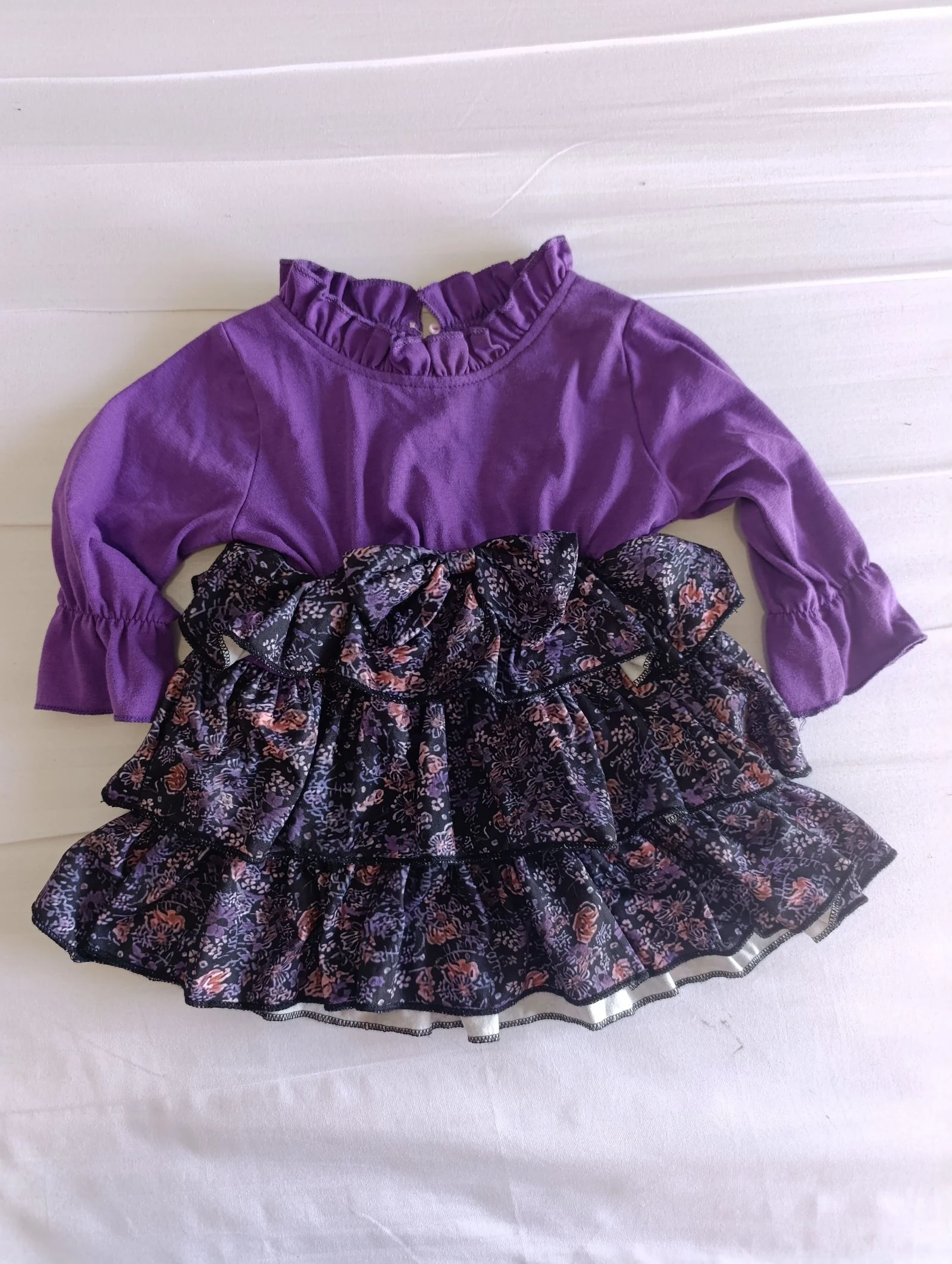 Precioso vestido niña morado con volantes 